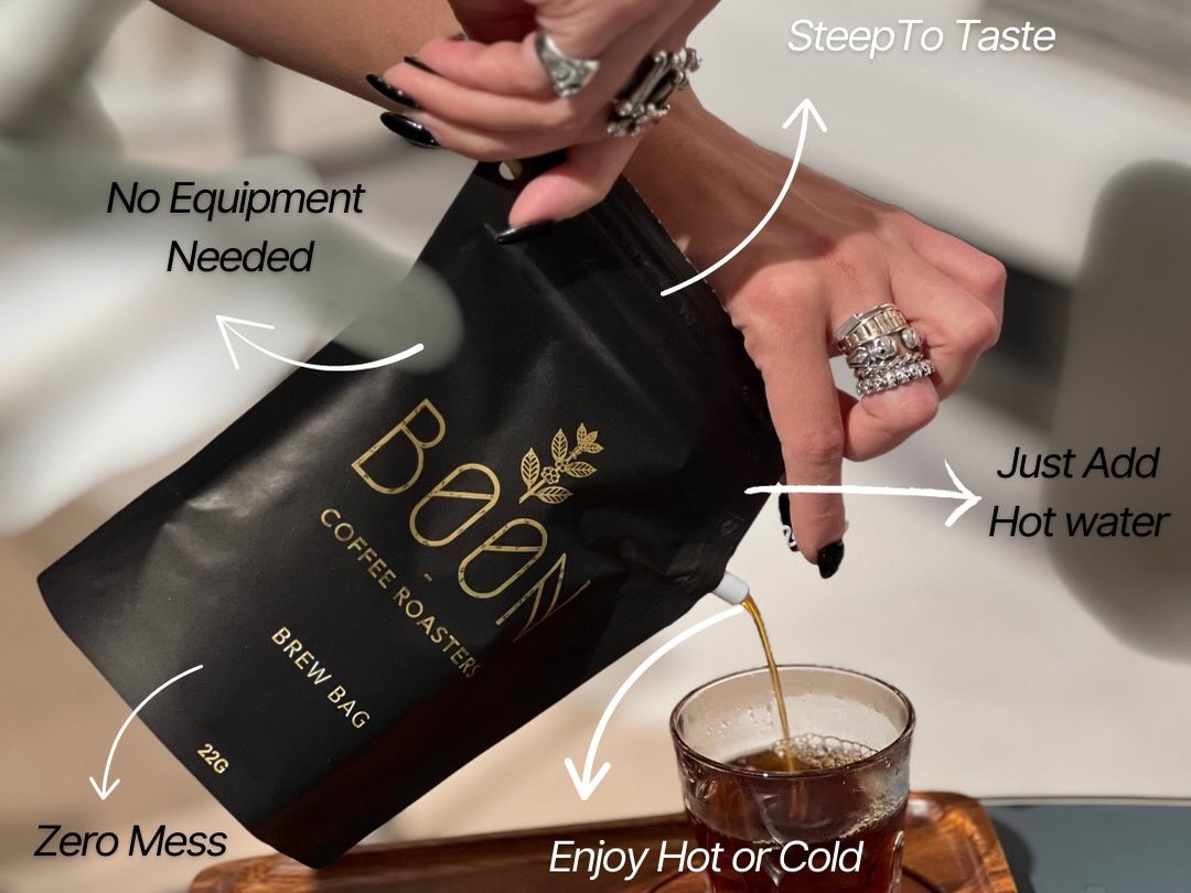 Boon brew bag poured over a glass of coffee